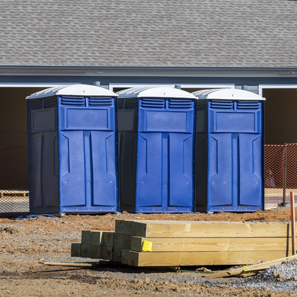 what is the cost difference between standard and deluxe porta potty rentals in Latham MO